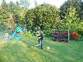 Football and swing ball by the climbing frame